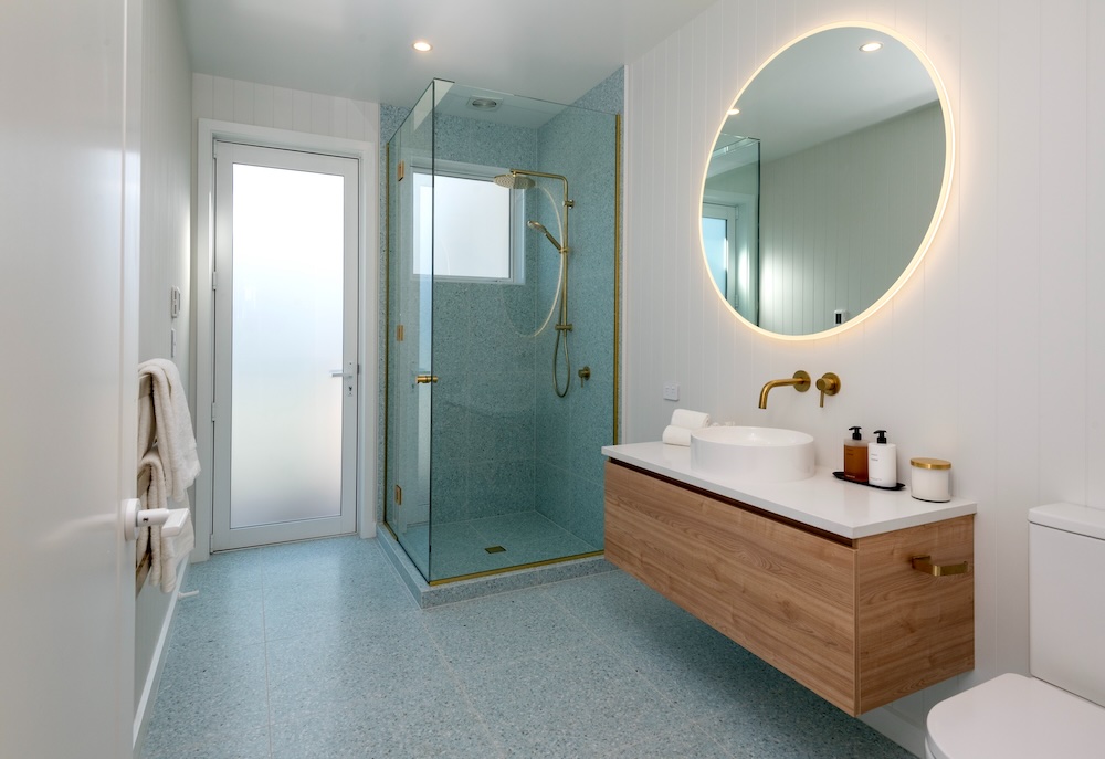 Modern bathroom design in new architectural home built by Metro Homes Auckland